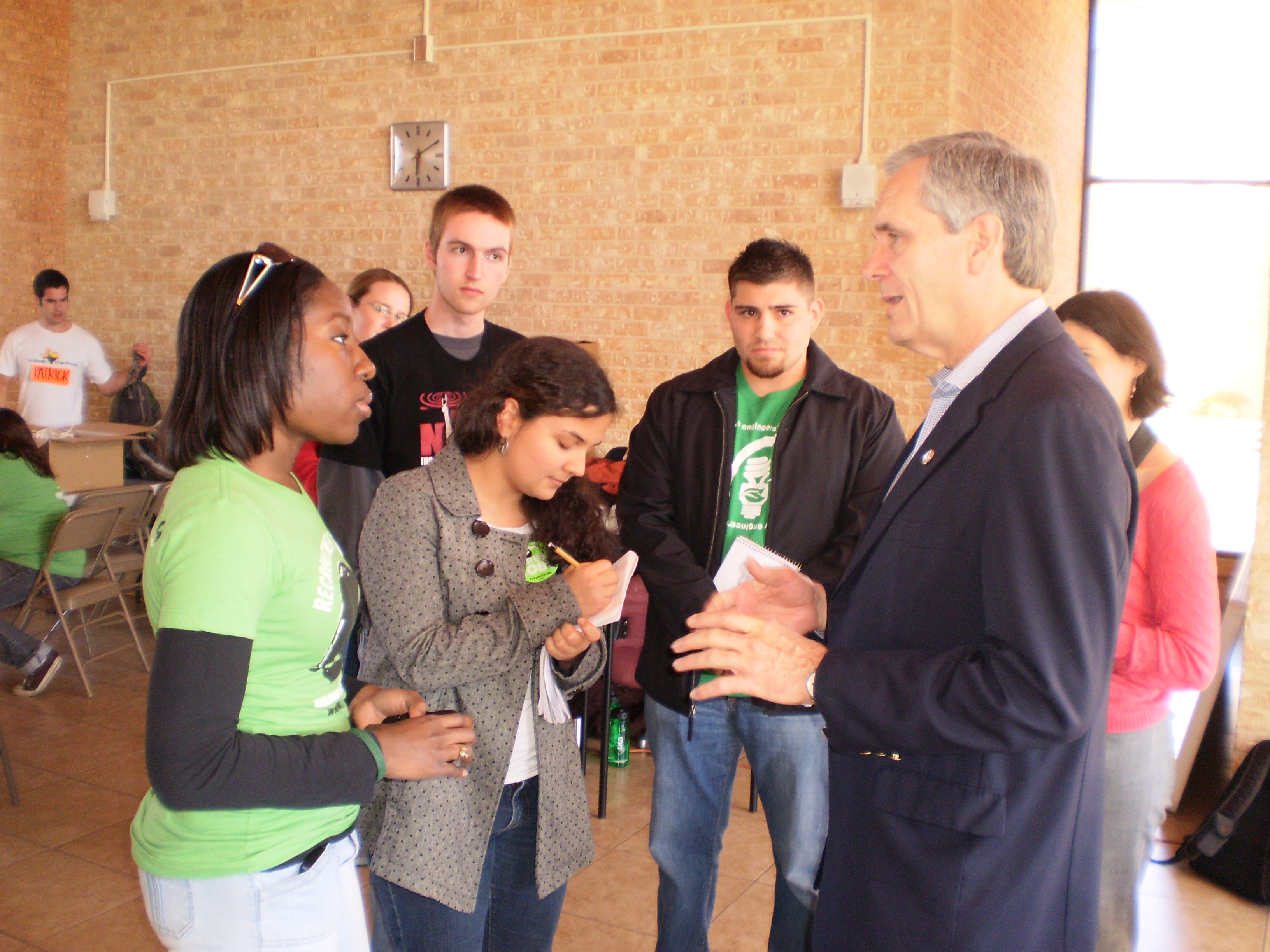Aggie Adrienne Jones (seen here talking to US Rep. Lloyd Doggett) sent a letter supporting SB 2182