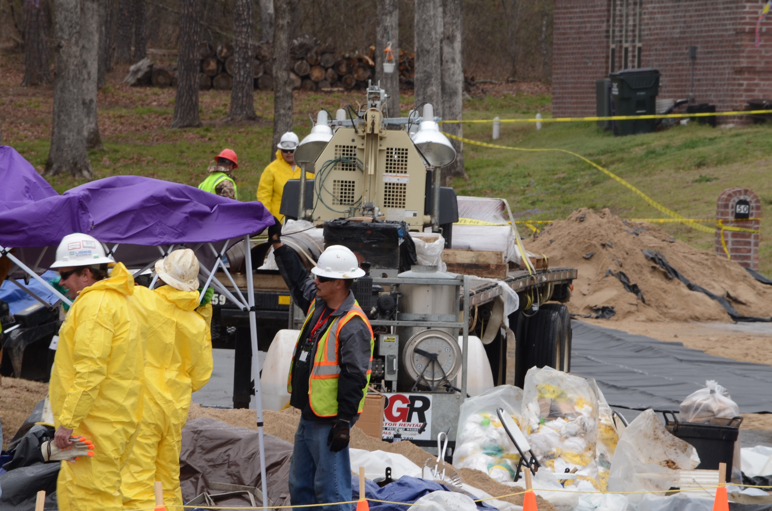 Documentary filmmakers, Elliott Gilbert,II and Joe Capps, run into a cleanup crew in Mayflower, AR.